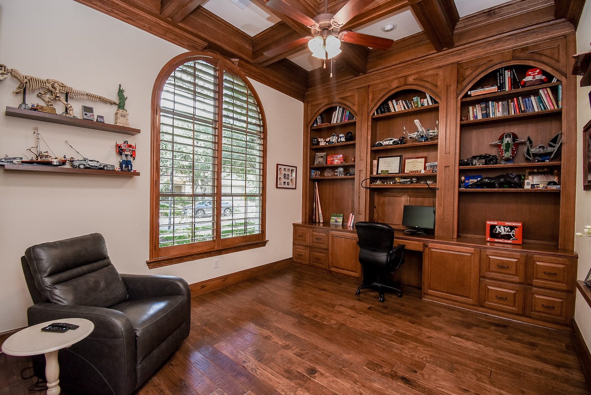 The study is perfect for your home office. Built in desk and shelving with a stunning ceiling treatment.