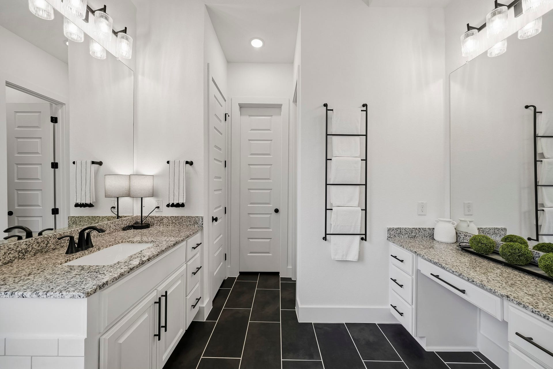 2514 Heritage Park Drive, Missouri City, TX 77459 A separate makeup vanity adds a touch of luxury, featuring a granite countertop, decorative mirror and dedicated light fixture for a beautifully appointed getting-ready space. Straight ahead is a generous sized walk-in closet, linen closet and private water closet.