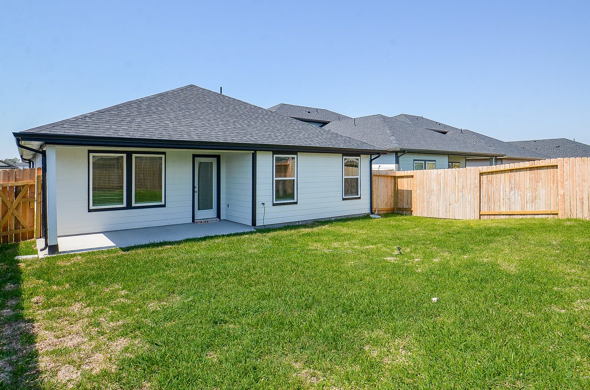7814 Bel Fiore Drive, Richmond, TX 77406 Charming single-story home with a spacious fenced backyard, perfect for outdoor activities and relaxation.