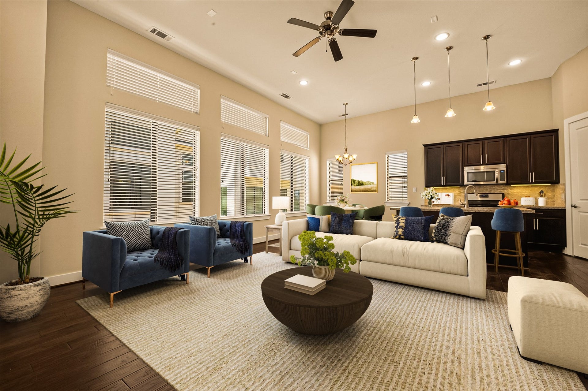 40 N Hutcheson Street, Houston, TX 77003 Spacious open-concept living area with high ceilings, abundant natural light, and elegant finishes, featuring a modern kitchen, and dining space.Virtually Staged.