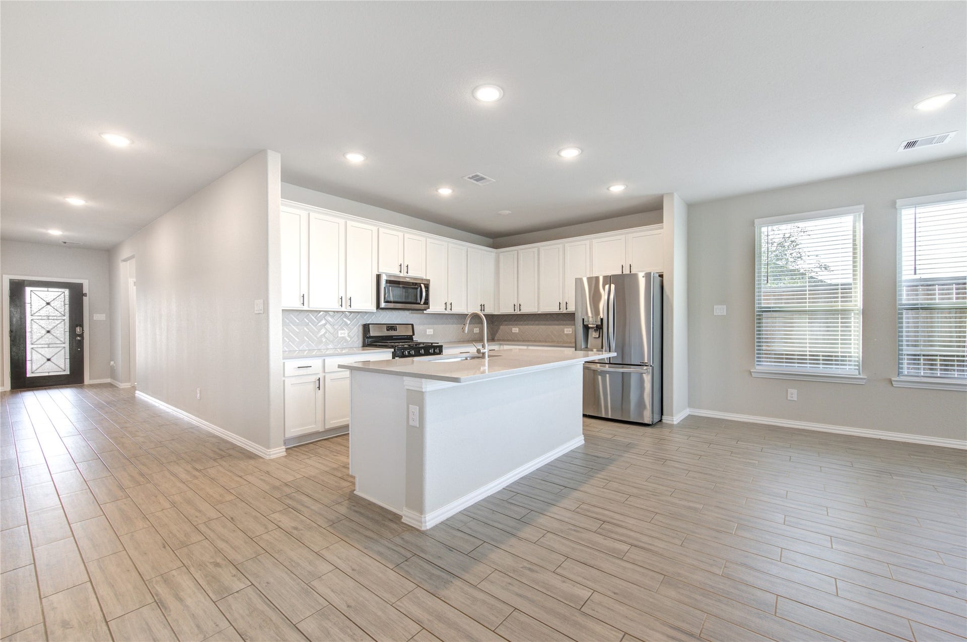Open kitchen with large island and plenty of counter space