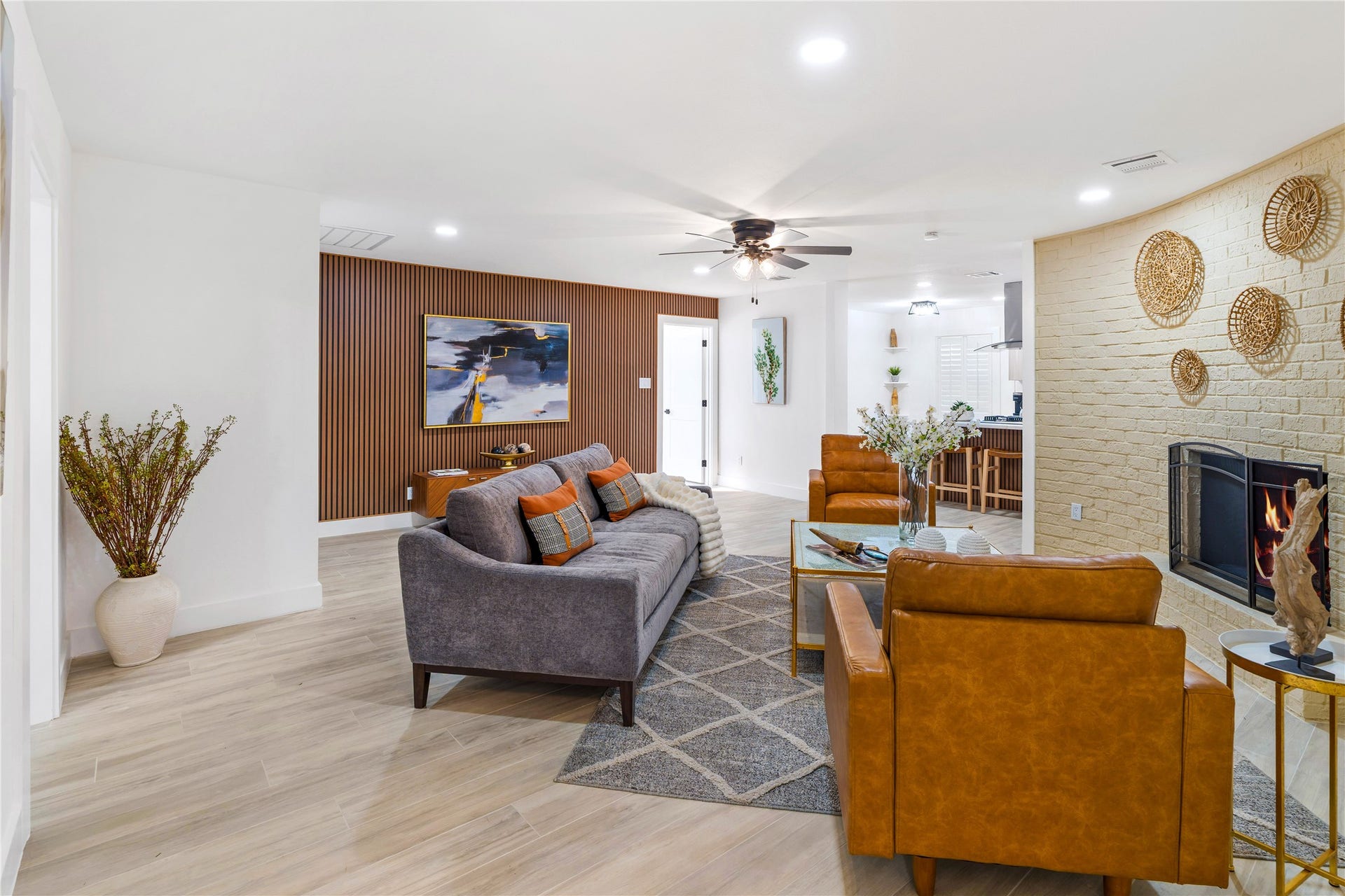 6203 Cheena Drive, Houston, TX 77096 Spacious living area featuring tile flooring, a fireplace, and an open, comfortable l
