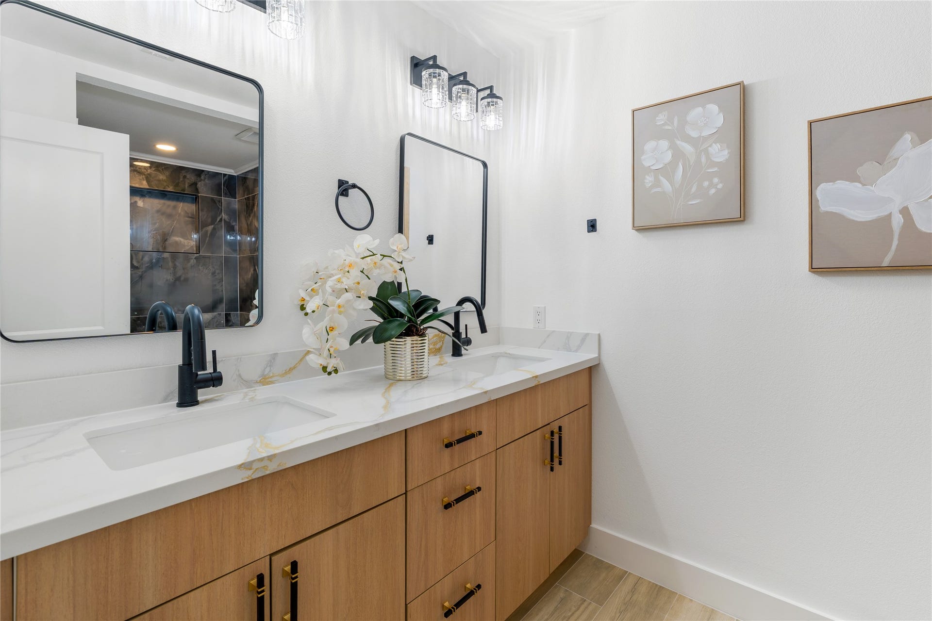 6203 Cheena Drive, Houston, TX 77096 Spacious bathroom vanity with dual sinks, generous counter space, and ample storage.