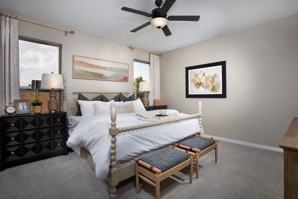 2019 Ardani Lane, Fresno, TX 77545 Unwind after a long day in this stunning primary suite! This spacious retreat features plush carpeting, neutral-toned walls, high ceilings, ceiling fan, recessed lighting, and large windows for comfort and tranquility.