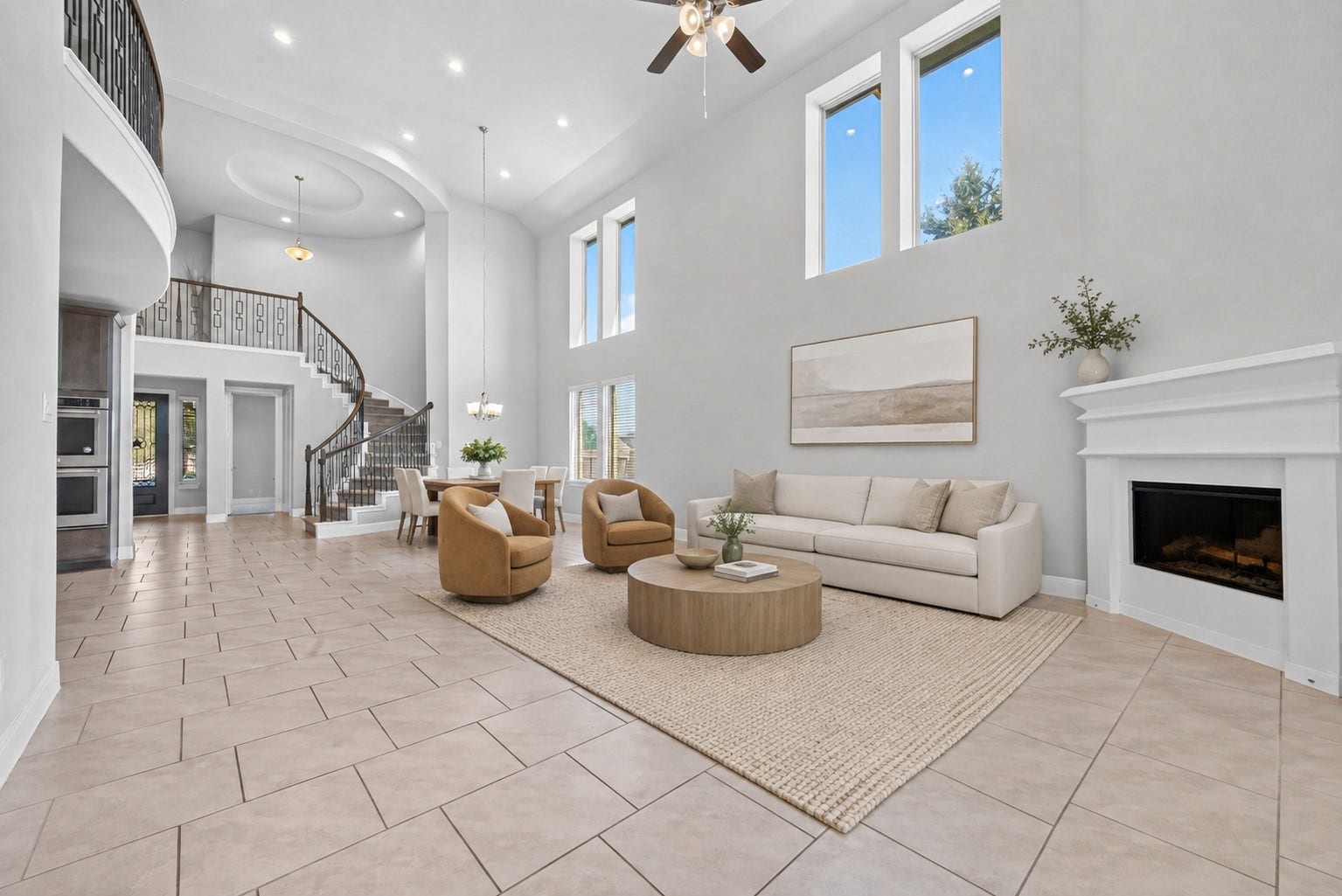 3514 Hampton Landing Court, Katy, TX 77494 Huge living room/dining room space filled with natural light, open to the kitchen and leading to the back patio. (virtually staged for inspiration)