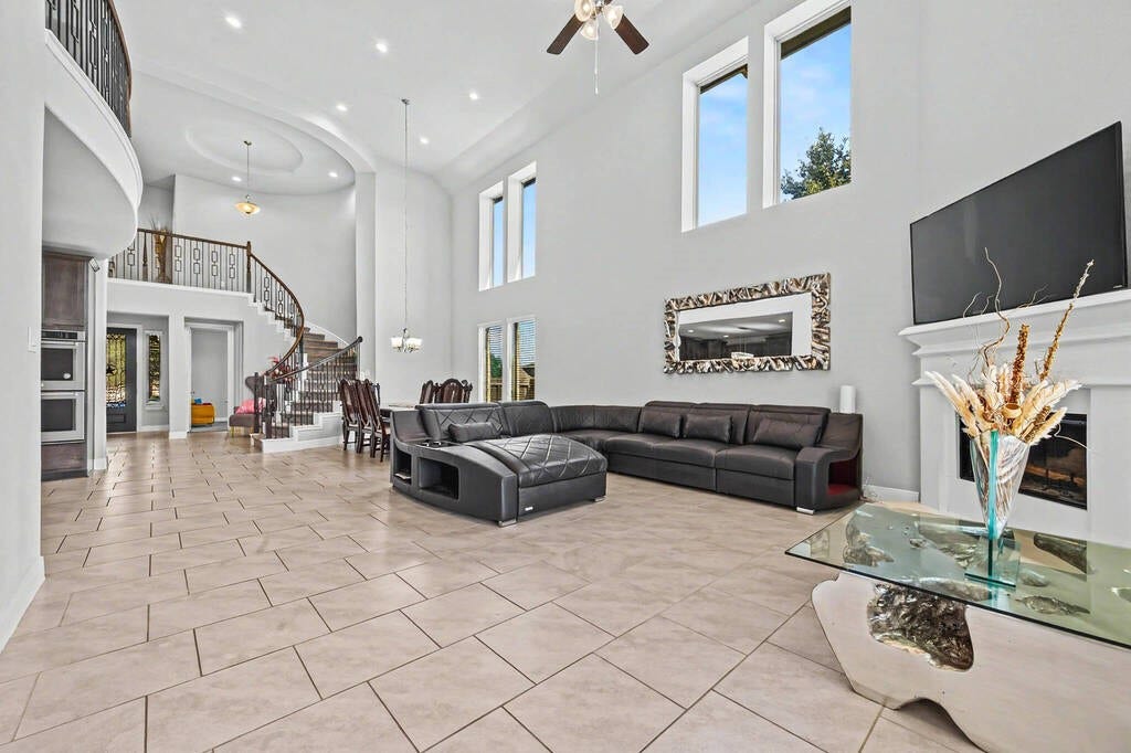 3514 Hampton Landing Court, Katy, TX 77494 Huge living room/dining room space filled with natural light, open to the kitchen and leading to the back patio.