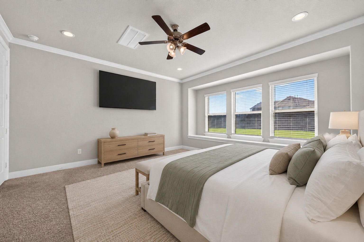 3514 Hampton Landing Court, Katy, TX 77494 Sun filled primary bedroom with extra large window window bench (virtually staged for inspiration)