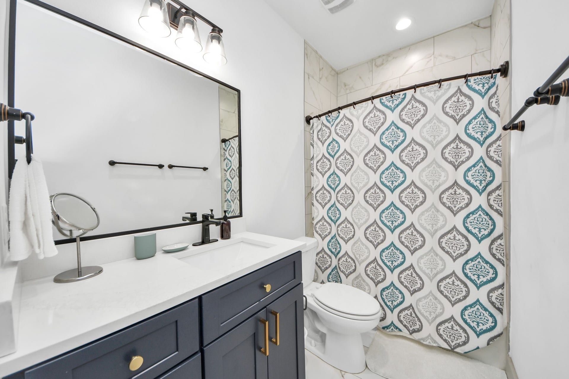 837 W Little York Road, Houston, TX 77091 Modern bathroom with contemporary finishes designed for both style and everyday functionality.