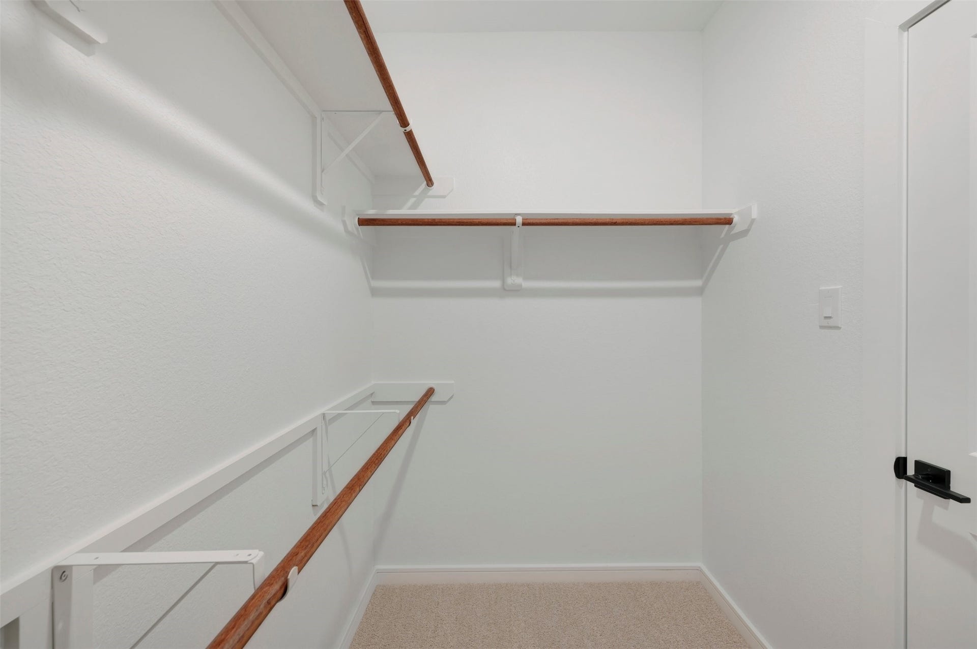 4005 Cardinal Way, Waller, TX 77484 One of two walk-in closets in the primary suite