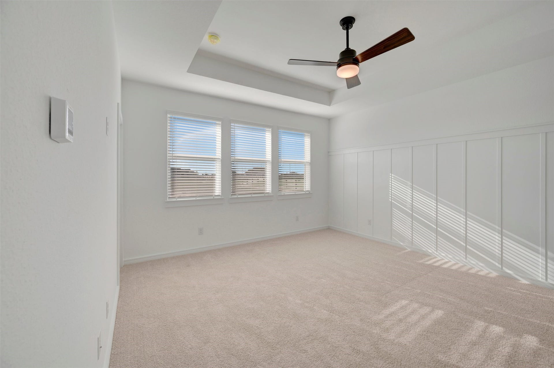 4005 Cardinal Way, Waller, TX 77484 Secluded primary suite with decorative feature wall