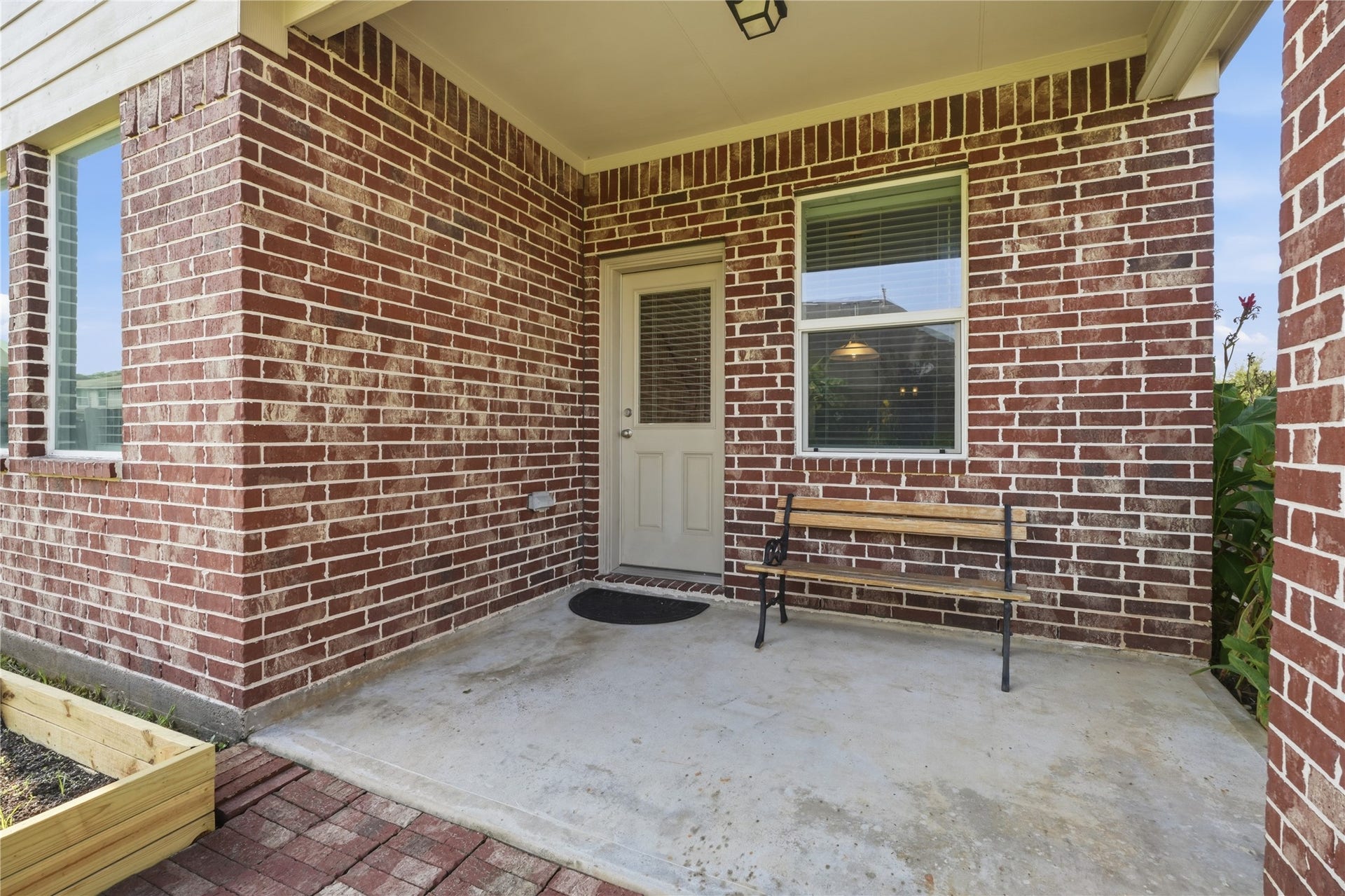 1717 Oakdale Mist Drive, Dickinson, TX 77539 Covered back patio provides a shaded space to enjoy the outdoors, with direct access to the home and views of the backyard.