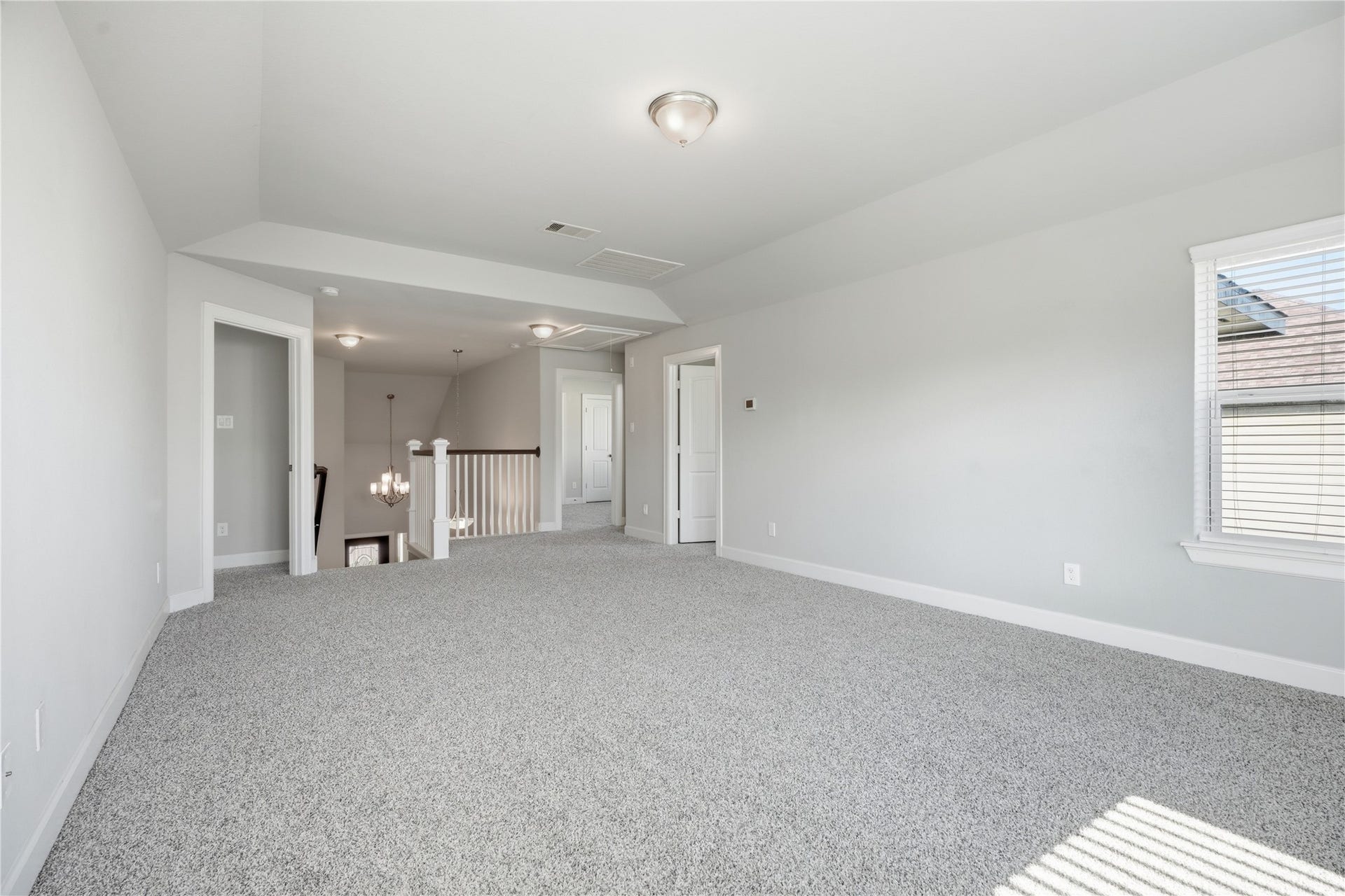 1717 Oakdale Mist Drive, Dickinson, TX 77539 The game room separates the upstairs sleeping areas, with one bedroom located on one side and the additional bedrooms and full bathroom on the otheran ideal layout for added privacy.