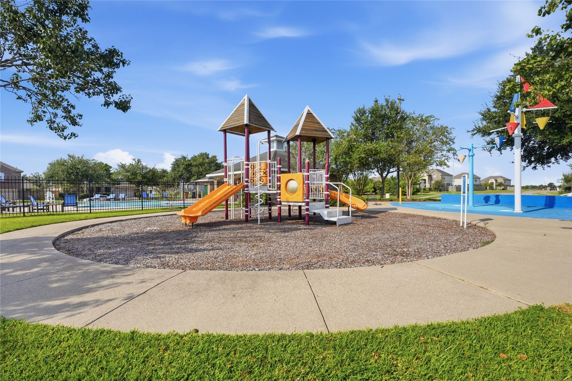 1717 Oakdale Mist Drive, Dickinson, TX 77539 Community playground provides an additional outdoor recreation space within the neighborhood.