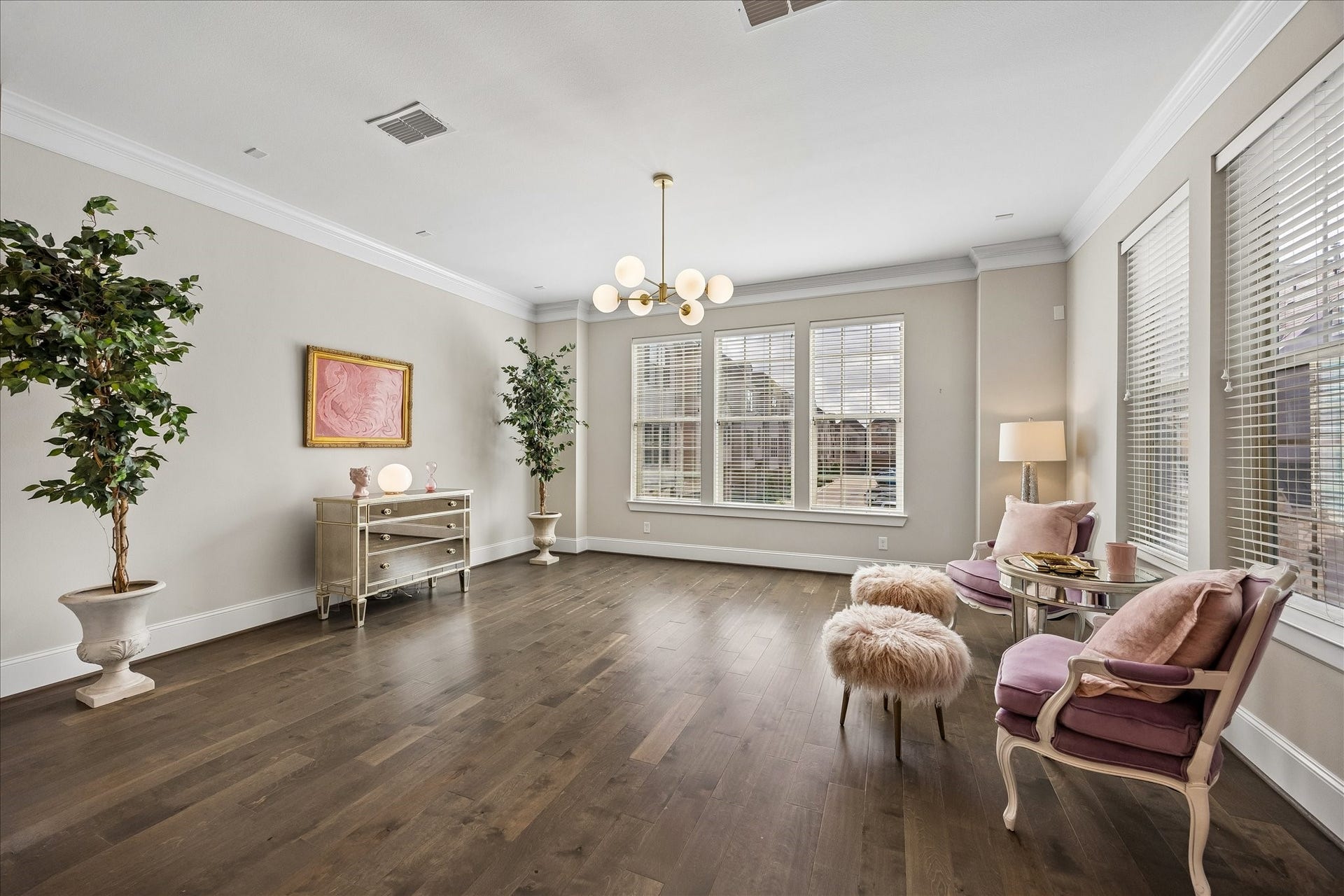 Another perspective of the spacious living room Open floor plan connects this room to the dining and kitchen, creating a wonderful flow between the main living spaces, perfect for gatherings & everyday enjoyment. Large windows, 9' ceilings & recessed lighting throughout enhance the light & airy feel of this beautiful 2nd floor.