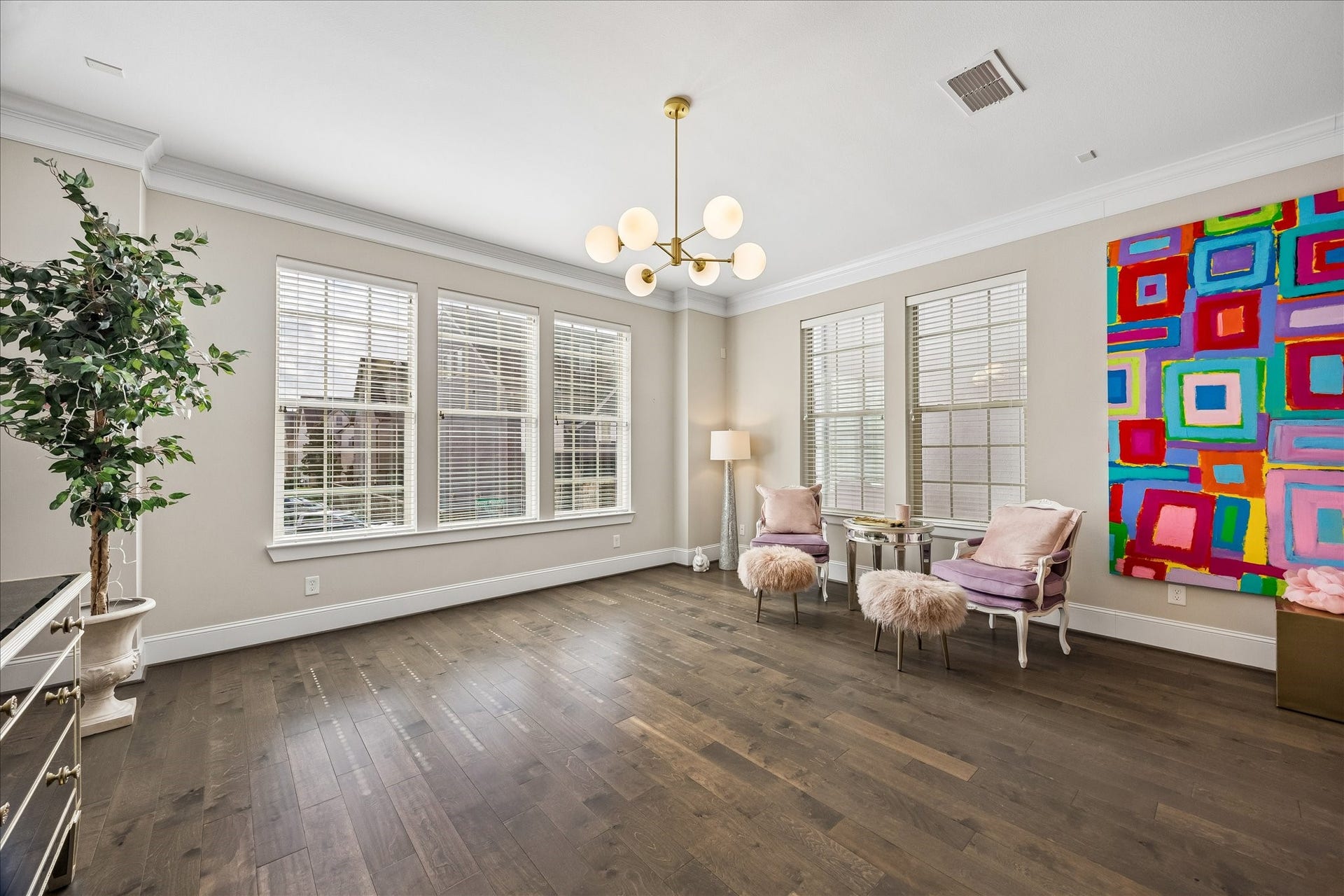 Stunning light-filled 2nd floor living room offering generous proportions & wonderful space for large furnishings! Expansive windows w/ blinds fill the room w/ abundant natural light while decorative lighting enhances the inviting atmosphere. Seamlessly opens to dining & kitchen, creating a fabulous open-concept floor plan ideal for everyday living & entertaining!