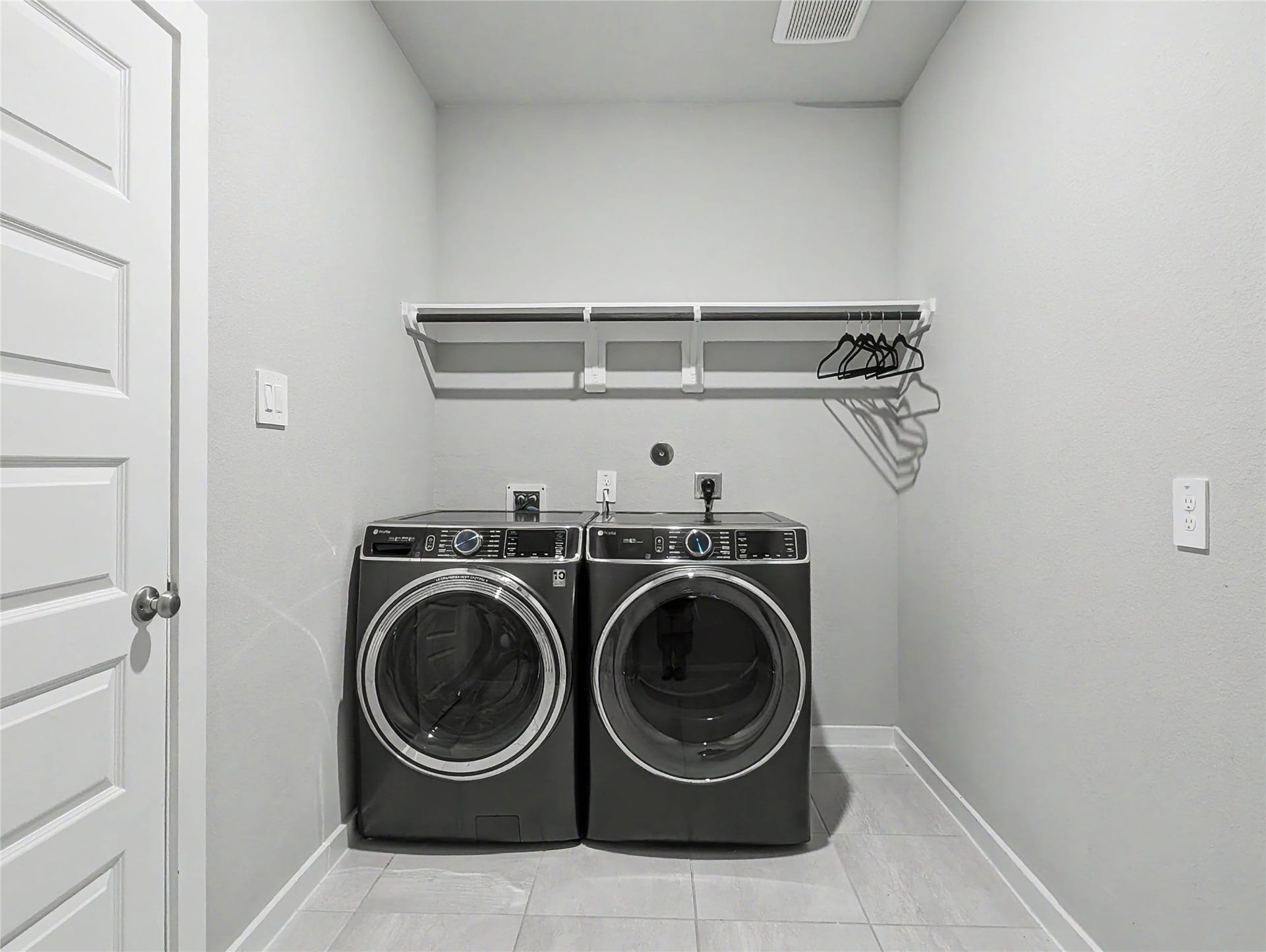 5122 Harvest Season Lane, Pearland, TX 77584 Utility room with washer / dryer included.