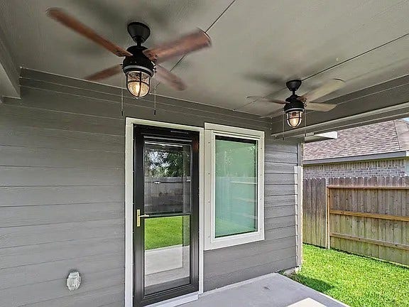 5122 Harvest Season Lane, Pearland, TX 77584 Back covered patio & back door