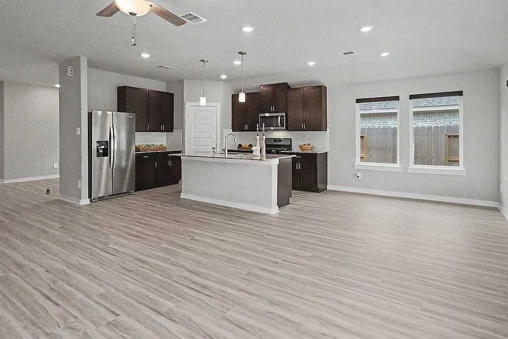 5122 Harvest Season Lane, Pearland, TX 77584 Kitchen / dining / living area