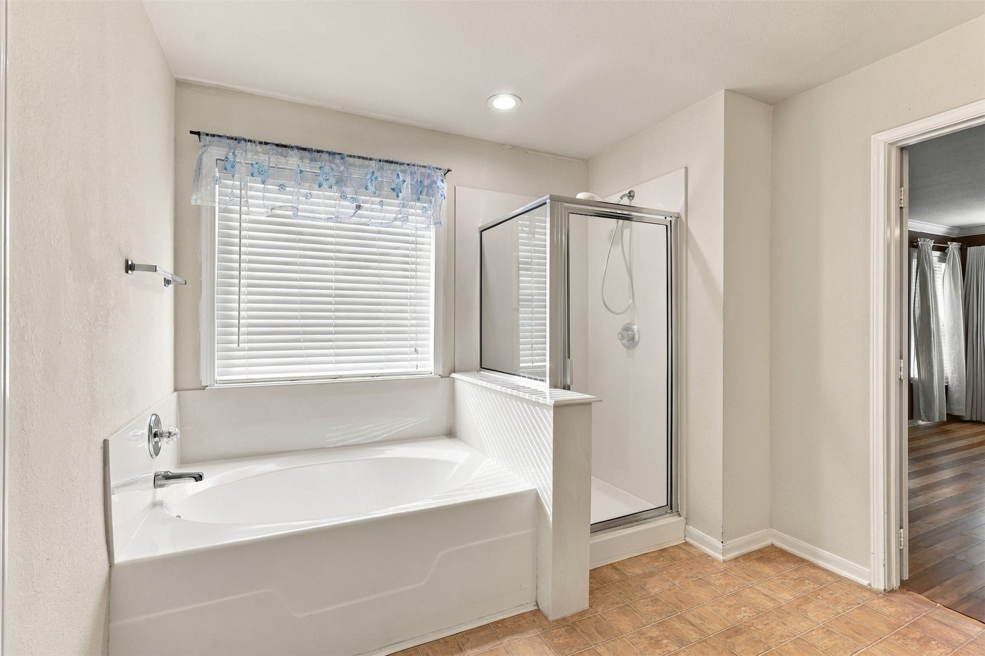 Separate tub and shower in the Primary