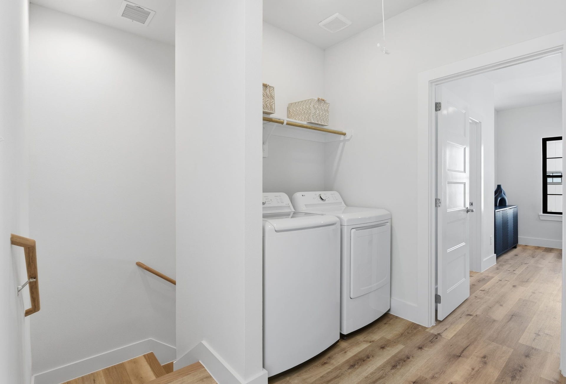 11930 S Hoa Sen Circle, Houston, TX 77072 Efficient third-floor utility room with easy access, designed to maximize space and convenience.