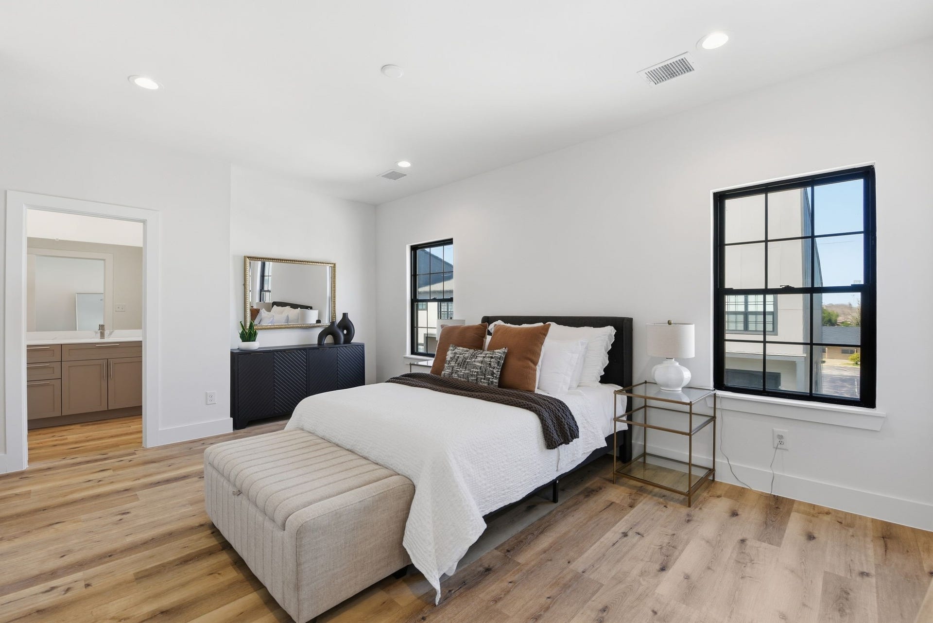 11930 S Hoa Sen Circle, Houston, TX 77072 Spacious primary suite on third floor with large windows and comfortable layout.