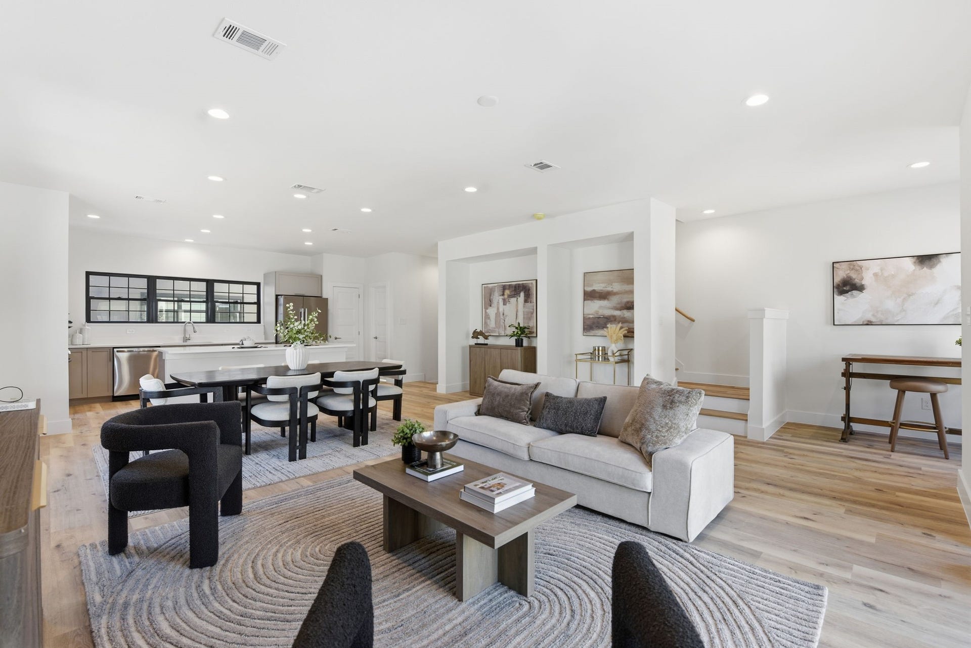 11930 S Hoa Sen Circle, Houston, TX 77072 (Photos are from the Model Home - and for representation only) Bright and open living area with modern finishes and abundant natural light.