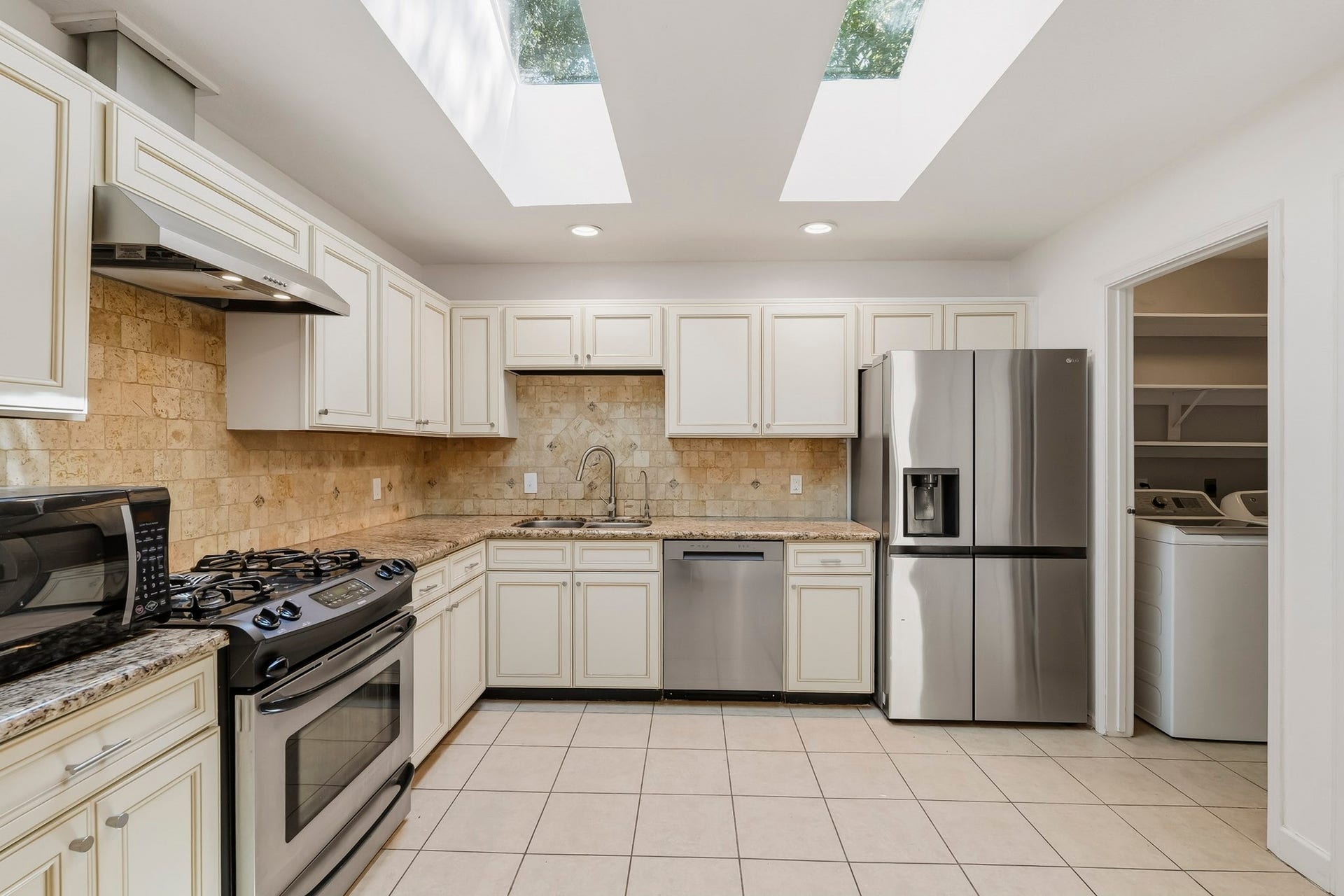 69 Wind Whisper Court, The Woodlands, TX 77380