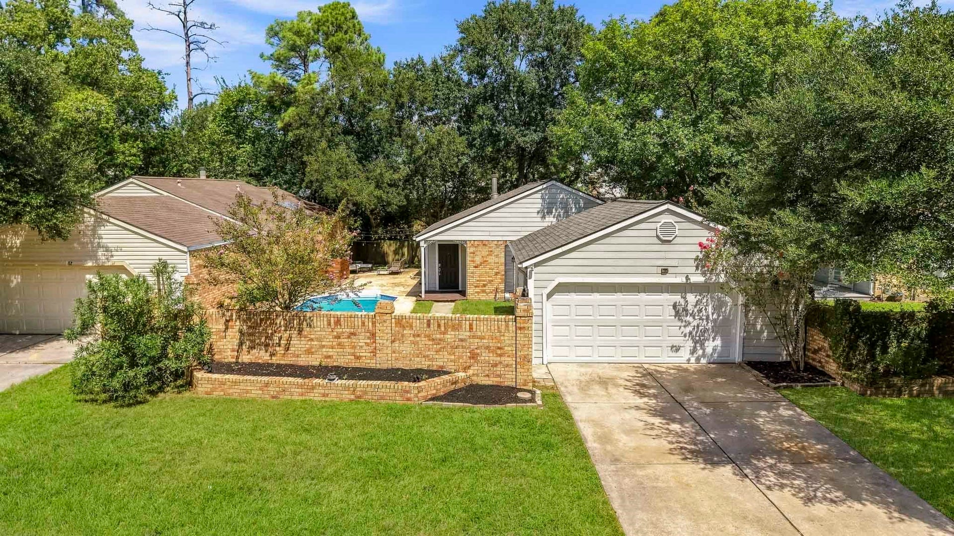 69 Wind Whisper Court, The Woodlands, TX 77380