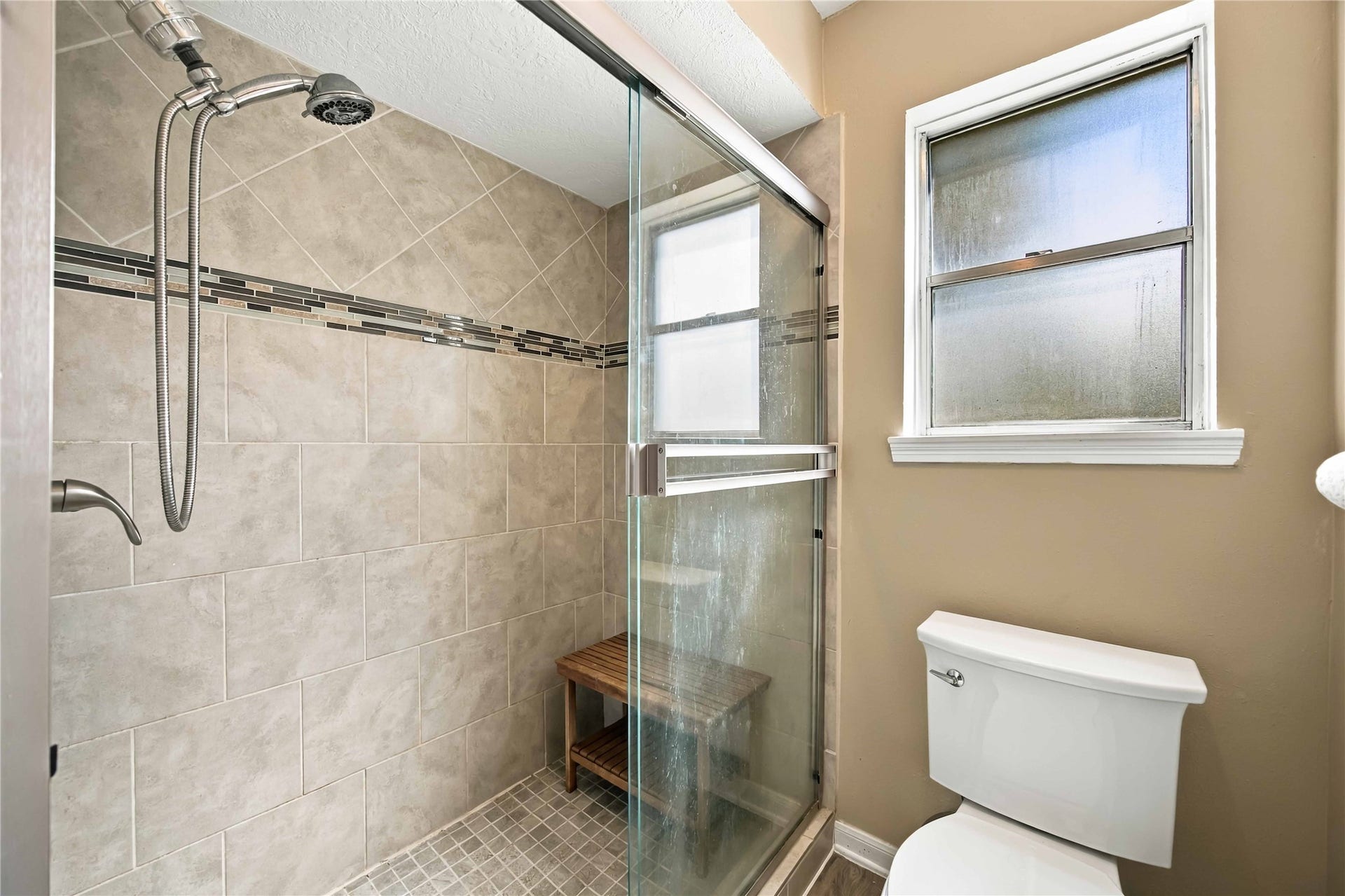 4697 Wickwillow Lane, Alvin, TX 77511 The Primary Bathroom has a separate shower as well as a tub/shower combo.