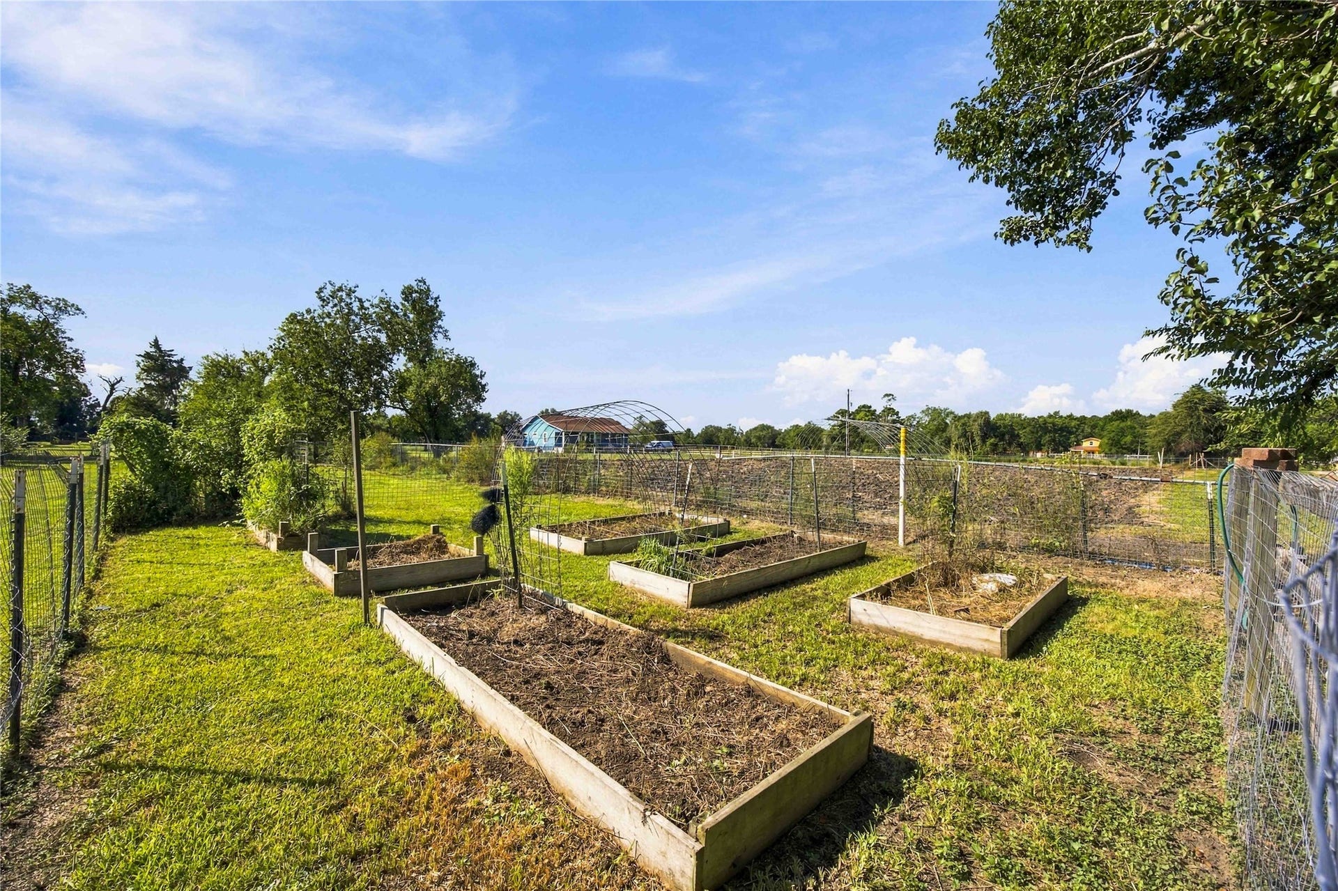 4697 Wickwillow Lane, Alvin, TX 77511 The raise planting beds for your vegetables.