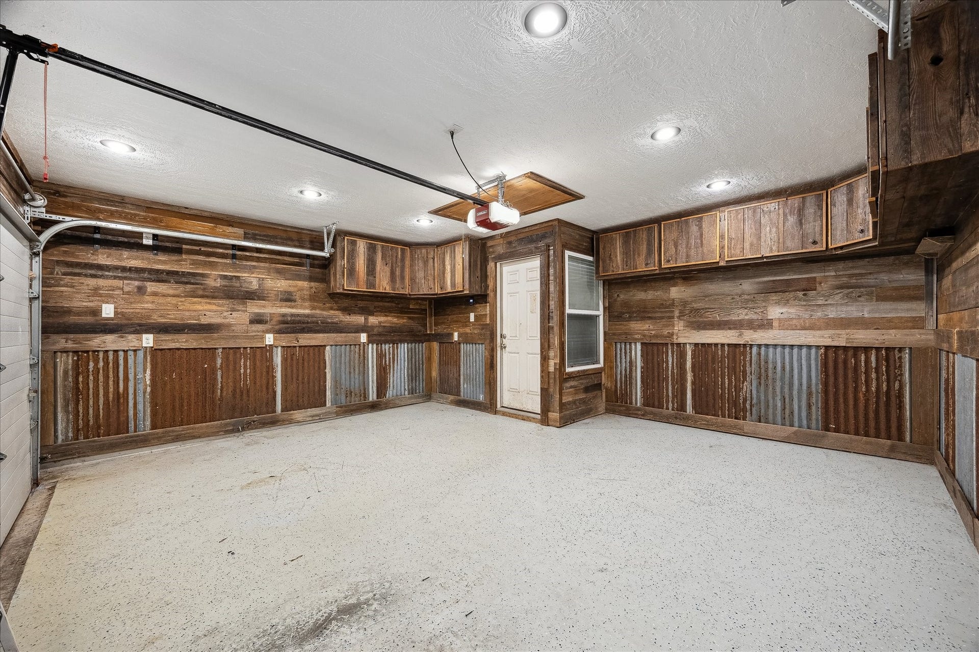 1325 Curtin Street, Houston, TX 77018 Garage features custom built shelving, plenty of storage