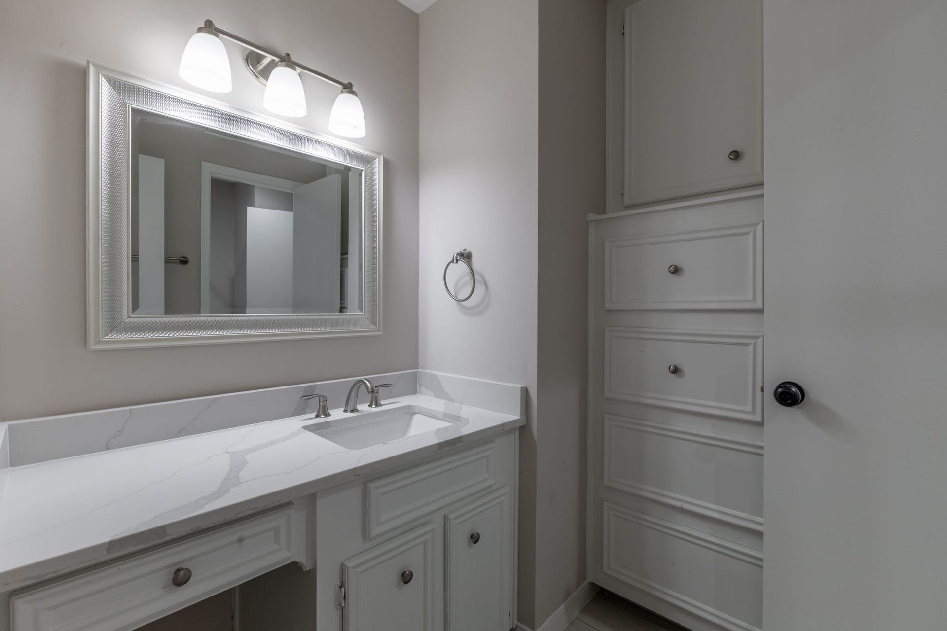 6506 Jadecrest Drive, Spring, TX 77389 quartz countertops in secondary bathroom with build in dresser