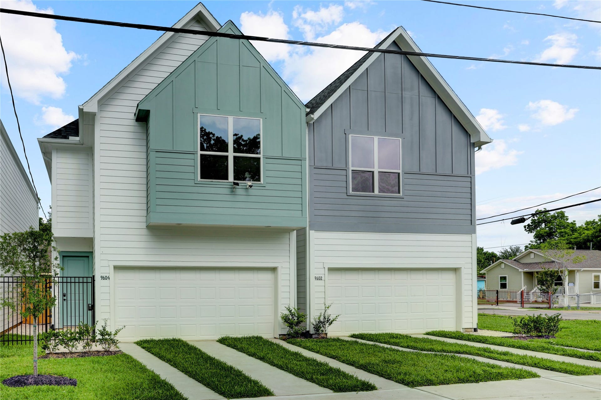 9608 Burden Street, Houston, TX 77093 9604 Burden on left has gated entry. Each home has 2 car garage.