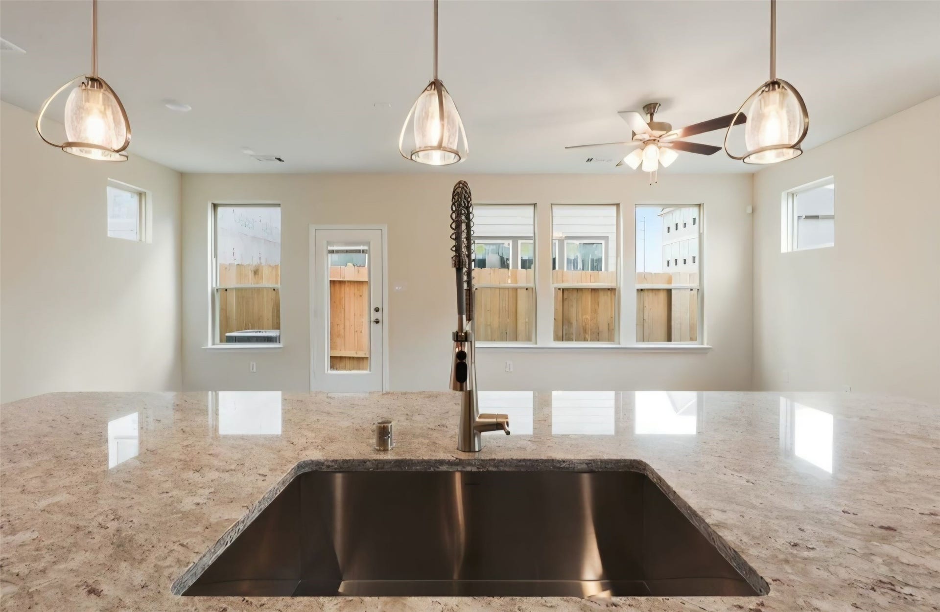 3104 Dakota Falls Drive, Houston, TX 77063 Kitchen island has built in large functional undermount sink