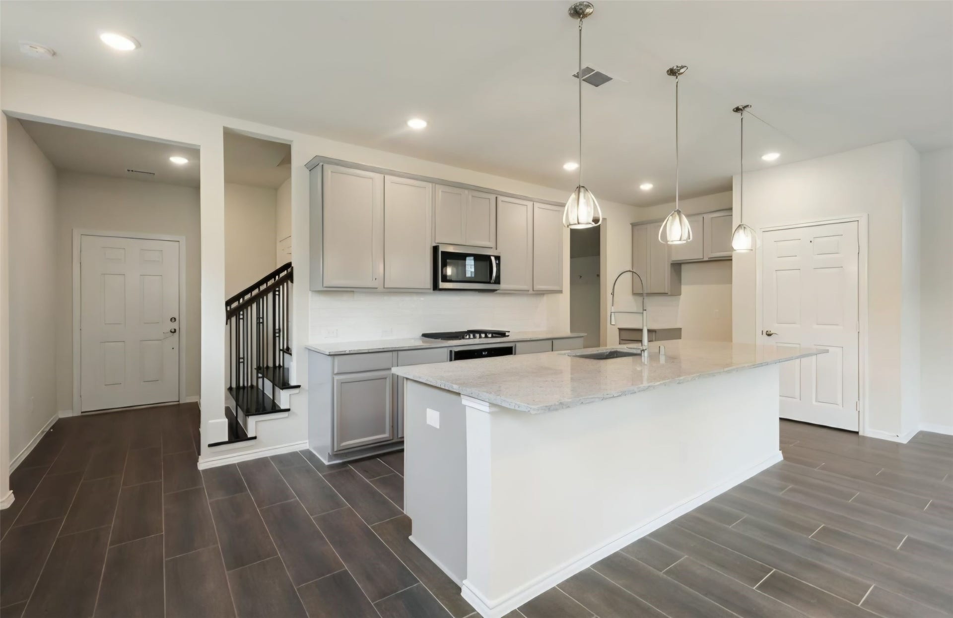 3104 Dakota Falls Drive, Houston, TX 77063 Kitchen and family areas have practical recessed lighting