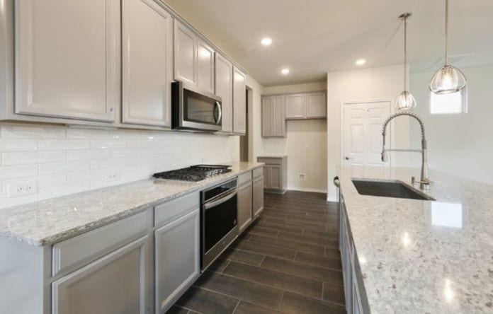 3104 Dakota Falls Drive, Houston, TX 77063 Spacious sink-in island kitchen with good amounts of counter space and cabinetry