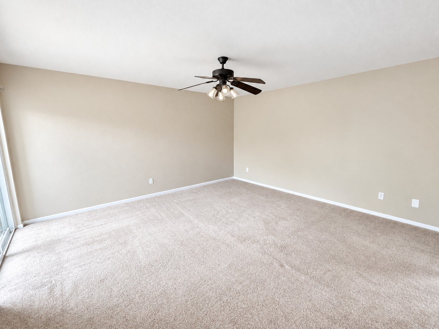 2026 Arcadia Drive, Sugar Land, TX 77498 Primary Bedroom: Generously sized bedroom with soft natural light, neutral finishes, and plenty of space to create a comfortable retreat.