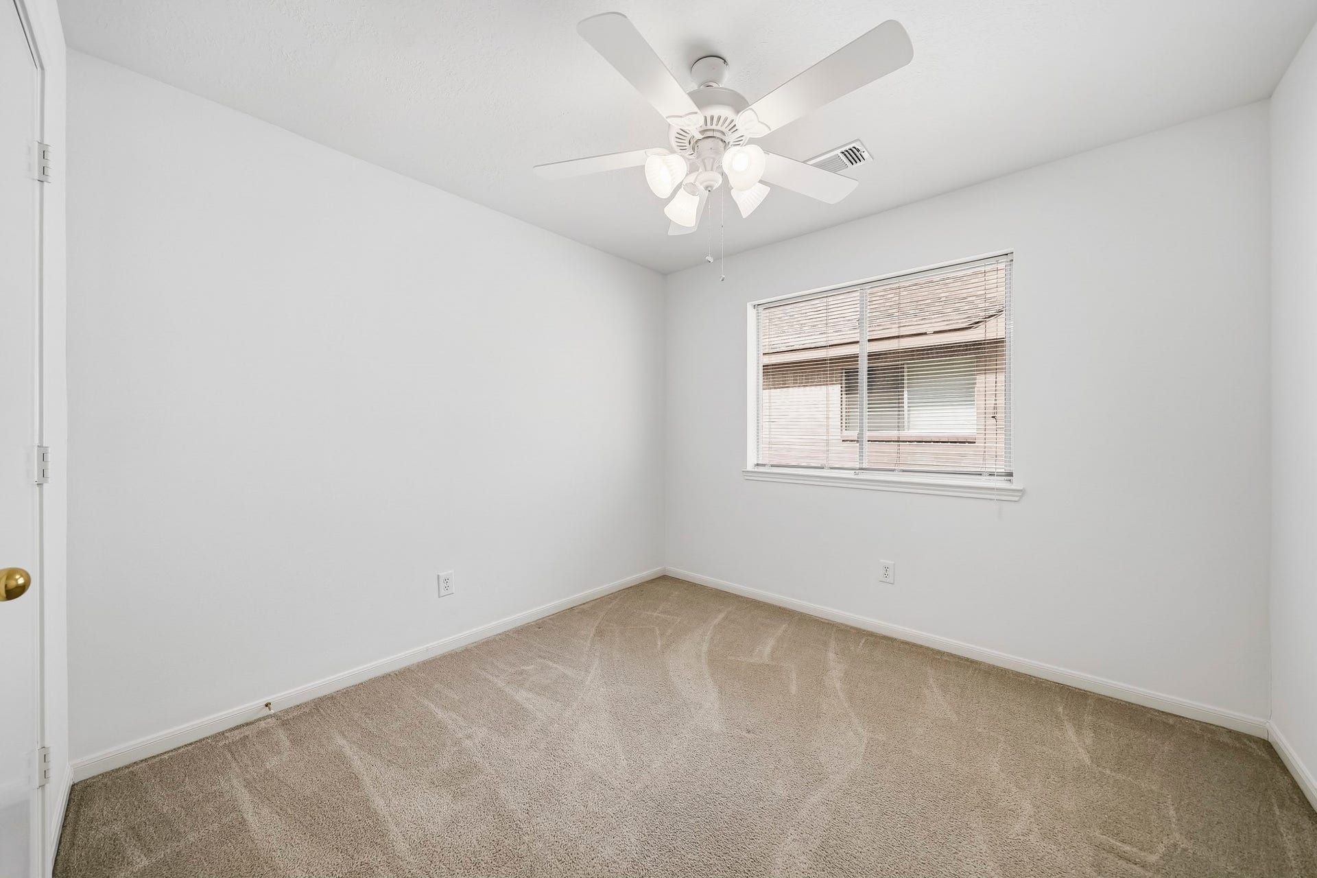 16831 Dunbar Grove Ct, Sugar Land, TX 77498 Another view of Bedroom #3 highlights the large window, which brings natural light into the room.