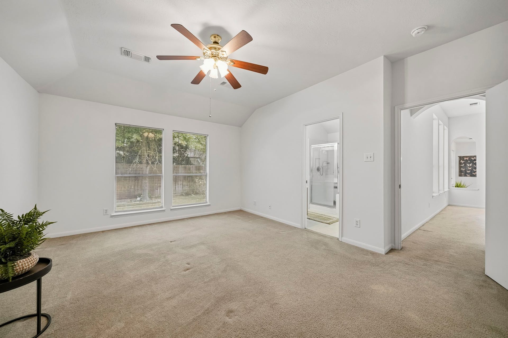 16831 Dunbar Grove Ct, Sugar Land, TX 77498 Located at the back of the home, the primary bedroom offers added privacy and peaceful views of the backyard.