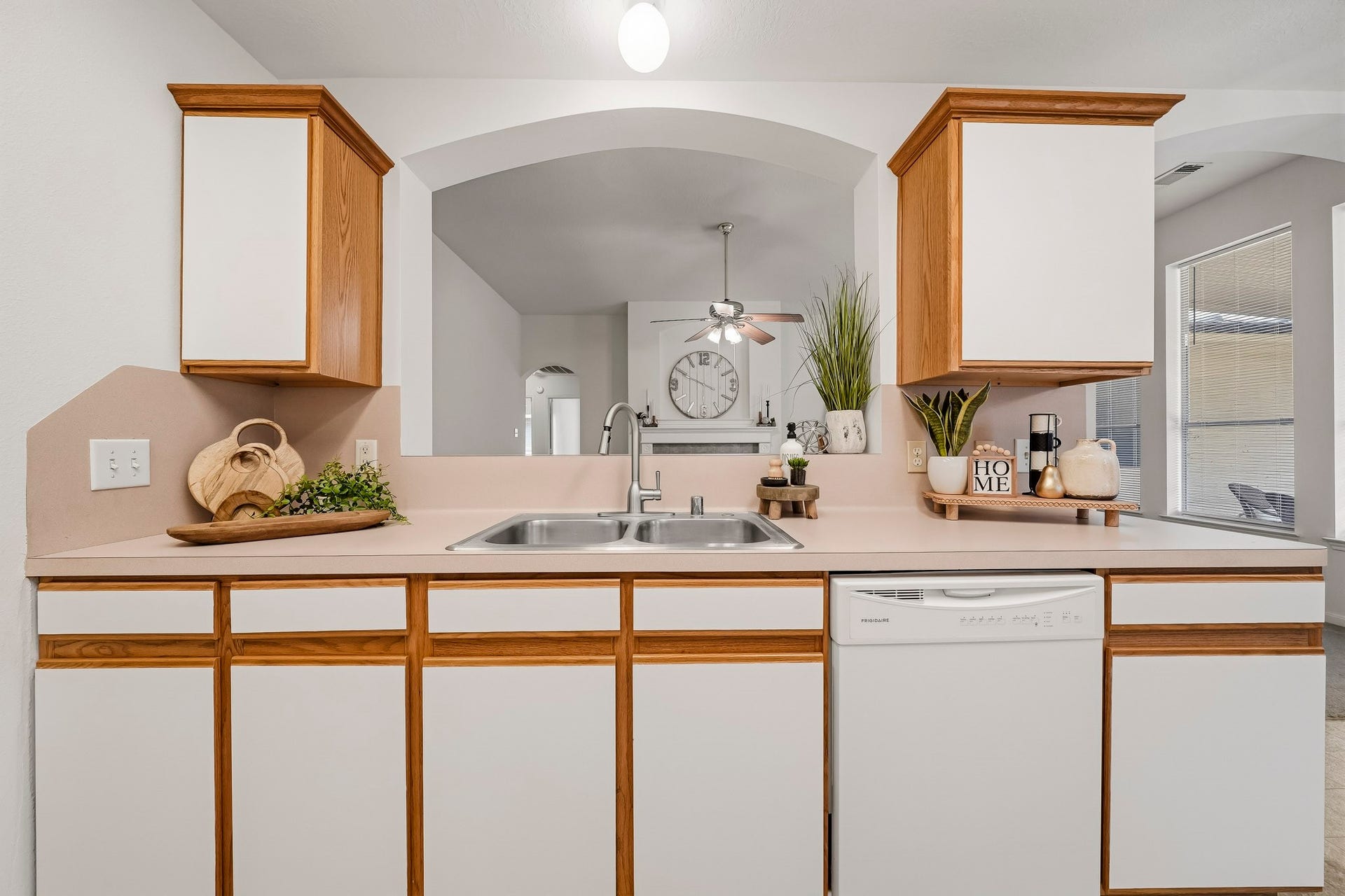 16831 Dunbar Grove Ct, Sugar Land, TX 77498 You'll never feel "stuck in the kitchen" and away from all the fun in this kitchen. From the kitchen sink, you have a clear sightline into the family room, along with access to additional cabinetry and a built-in dishwasher.