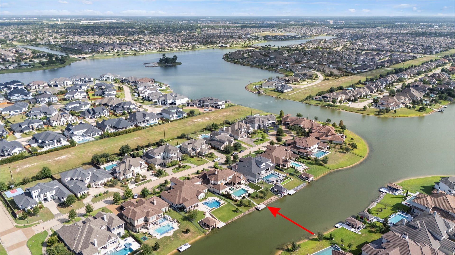 10314 Joshua Creek Court, Cypress, TX 77433 Aerial photo showcasing the prime waterfront setting within Towne Lake.