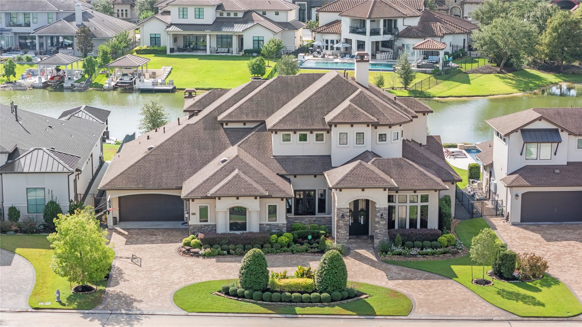 10314 Joshua Creek Court, Cypress, TX 77433 Stunning brick/stucco waterfront home in the gated Water's Edge section of Towne Lake.
