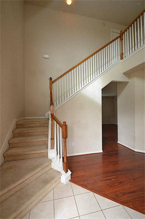 2502 Quiet Sage Lane, Katy, TX 77494 Experience the airy elegance of this home with its impressive high ceilings, creating a spacious and inviting atmosphere.