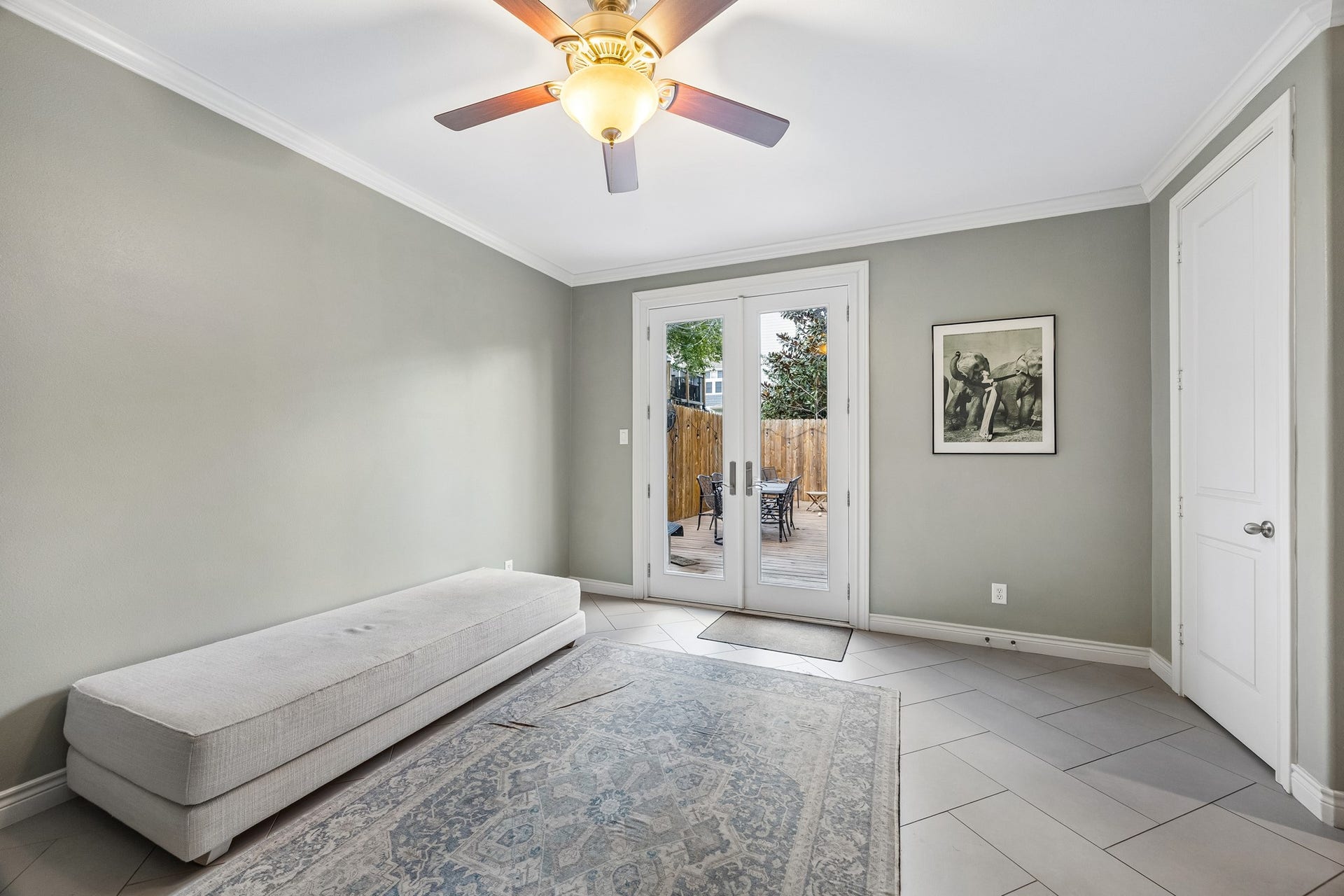 This space offers many options: office, entertaining or guest suite and provides direct access to the private outdoor space through glass french doors.