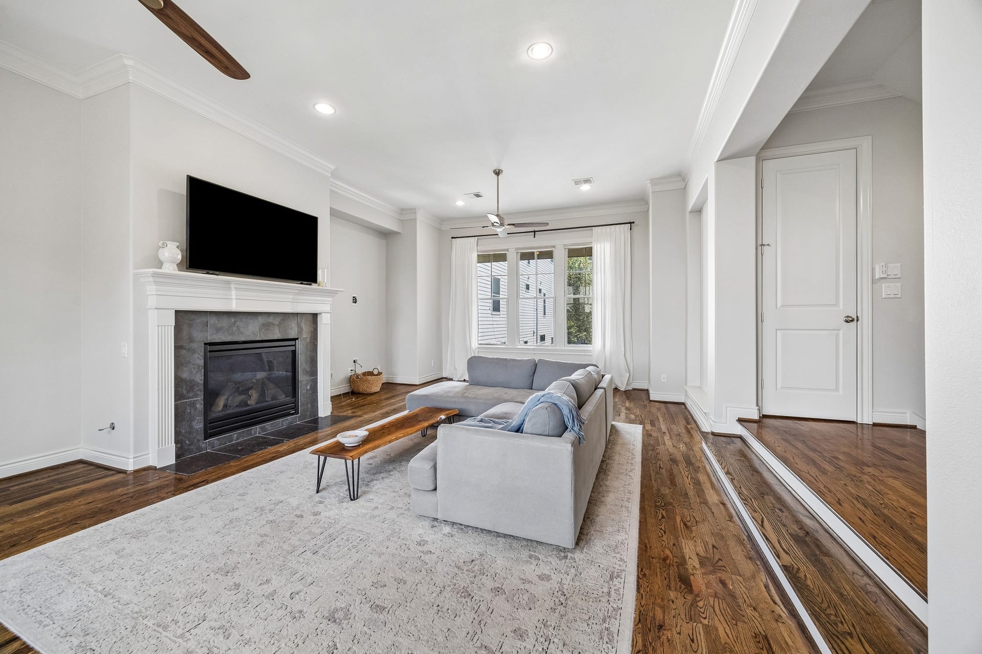 Spacious second floor living room offers the option of combinging living with dining, if preferred. The door to the right opens into the conveniently located powder room.