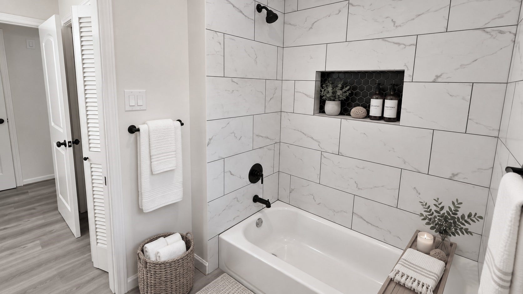 5527 Wigton Drive, Houston, TX 77096 Virtually staged: Secondary bath accented with simple spa-inspired dcor to complement the updated tile surround.