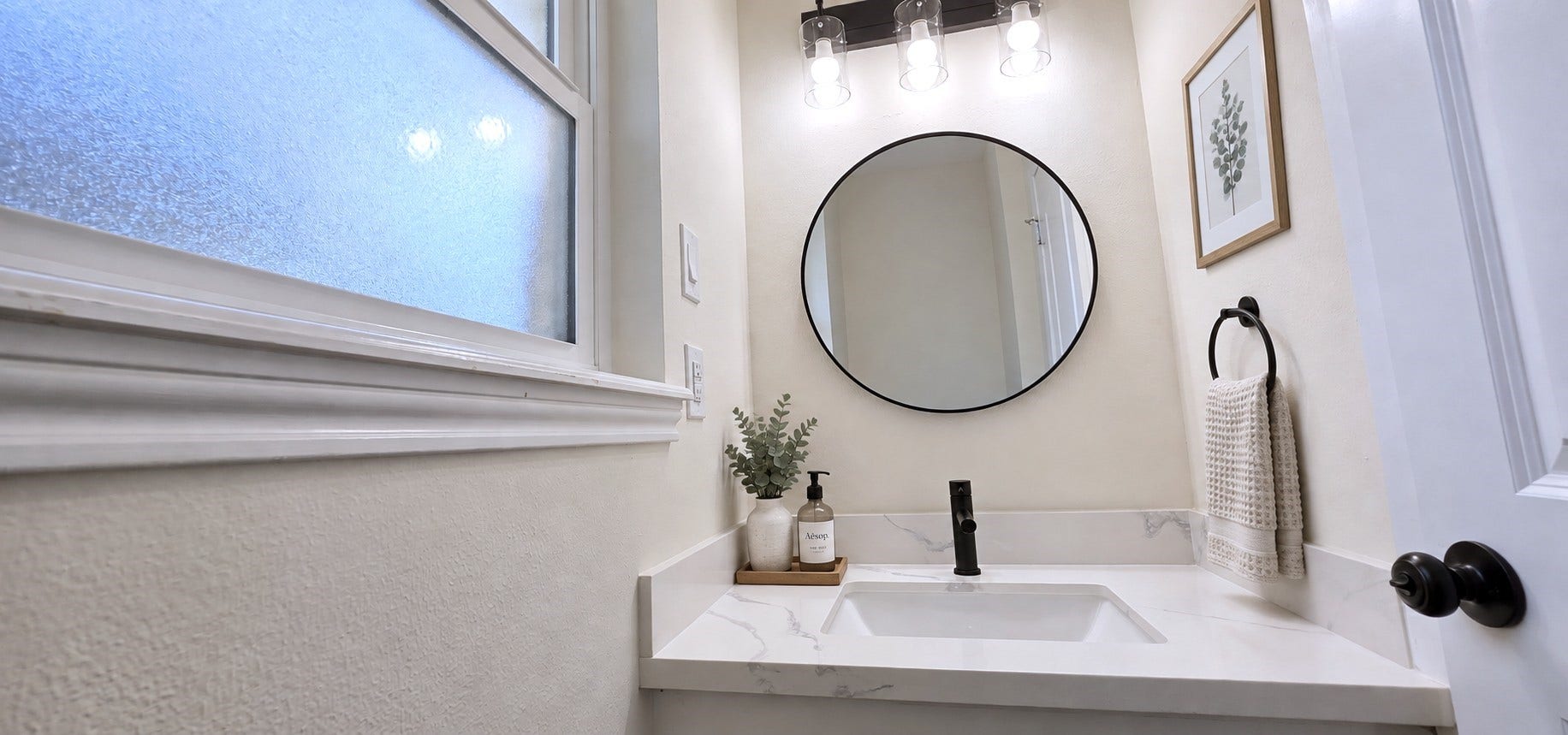5527 Wigton Drive, Houston, TX 77096 Virtually staged: Powder room styled with understated dcor to showcase its crisp, modern finishes.