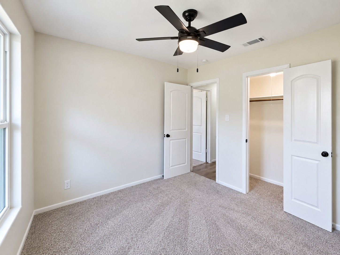 5527 Wigton Drive, Houston, TX 77096 Additional secondary bedroom provides flexible space for family, guests, or a second home office.