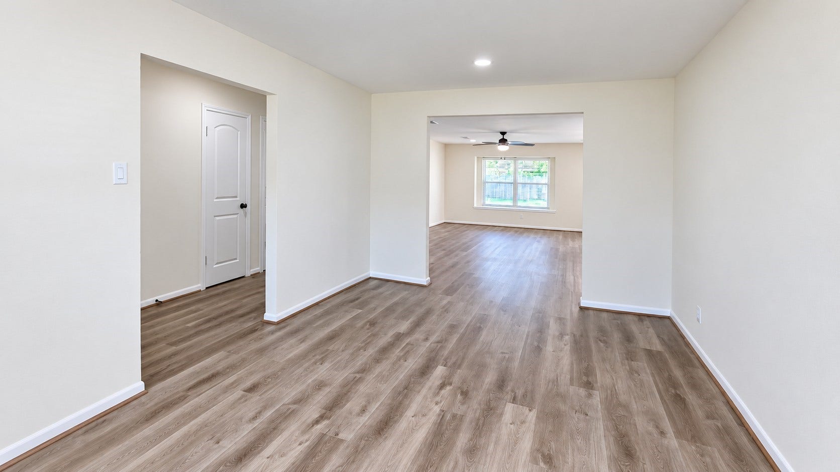5527 Wigton Drive, Houston, TX 77096 Flexible front room offers an ideal setting for a home office, study, or additional sitting area.