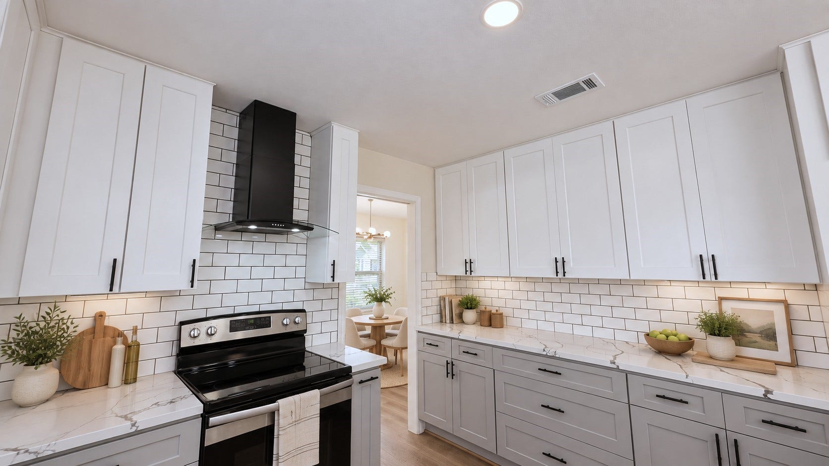 5527 Wigton Drive, Houston, TX 77096 Virtually staged: Modern kitchen styling brings out the clean white-and-black design and functional workspace.